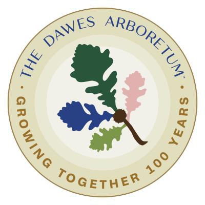 The Dawes Arboretum's new Centennial log features four leaves on the bur oak leaf: pink, green, dark blue and a darker green that all represent something special about The Arboretum. It has a tan badge surrounding it that says "The Dawes Arboretum: Growing Together 100 Years."